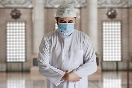 Religious asian muslim man prayingの写真素材