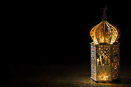 Arabic lantern glowing at nightの写真素材