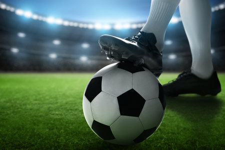 Professional soccer player in actionの写真素材