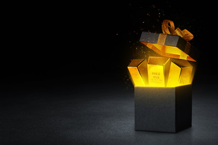 Flying open black gift box with ribbon and shiny gold bars floating with glitter sparkle effect...