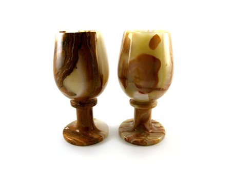 Two glasses from multi-coloured onyx isolated on a white backgroundの写真素材