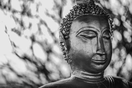 Buddha statue on black and white.の写真素材