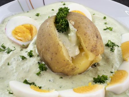 Green sauce with potato and eggsの写真素材