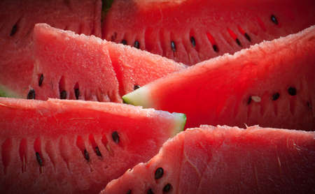arranged slices of watermelon の写真素材