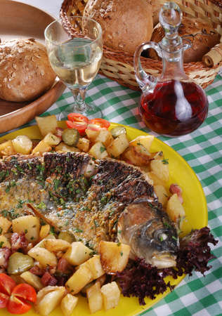 Served carp with vegetablesの写真素材