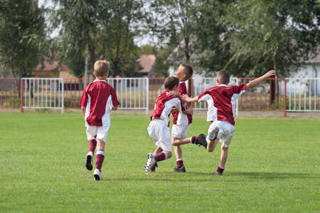 happy boys rejoices after victoryのeditorial素材