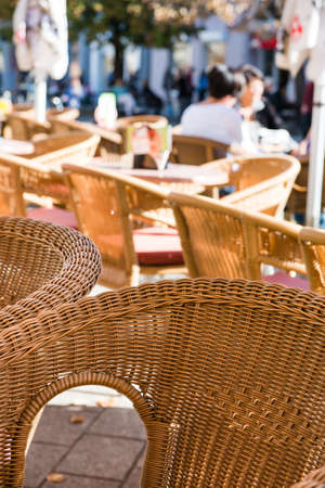 wicker chairs in cafe gardenの写真素材