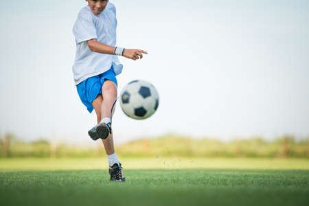 Little Boy Shooting at Goalの写真素材