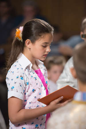little girl reads the prayerの写真素材