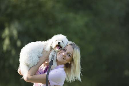 portrait of a young girl with her dog