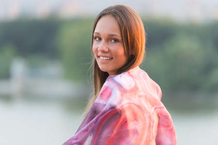 young lady posing with sashの写真素材