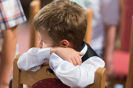 little boy have first communionの写真素材