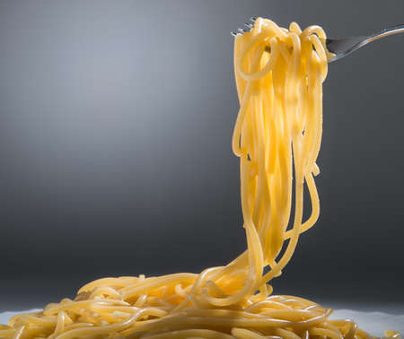 cooked spaghetti in a plateの写真素材