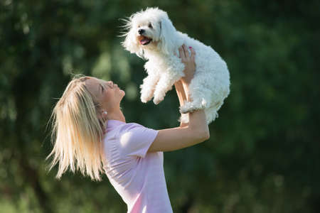 portrait of a young girl with her dog