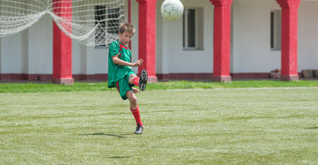 Little Boy Shooting at Goalの写真素材