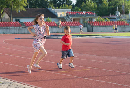 children running on the trackの写真素材