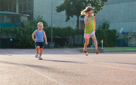 children running on the trackの写真素材
