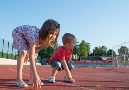 children running on the trackの写真素材