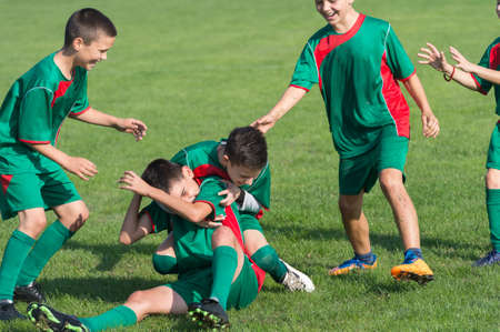 victory on Kids football matchの写真素材