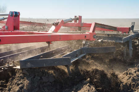 Tractor preparing land for sowing
