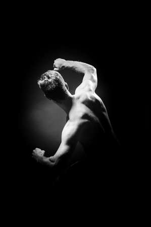 Male fitness model posingの写真素材