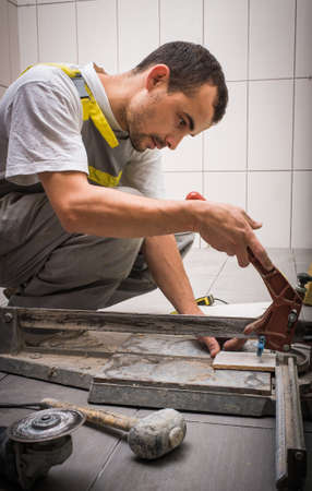 Install ceramic tiles in bathroomの写真素材