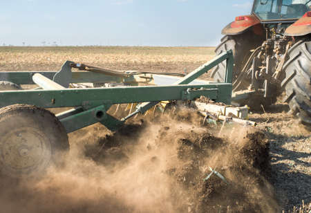 Tractor preparing land for sowingの写真素材