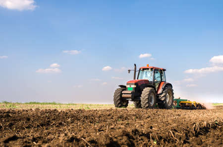 Tractor preparing land for sowing