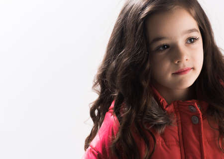 Close-up portrait of a little girl lin the studio