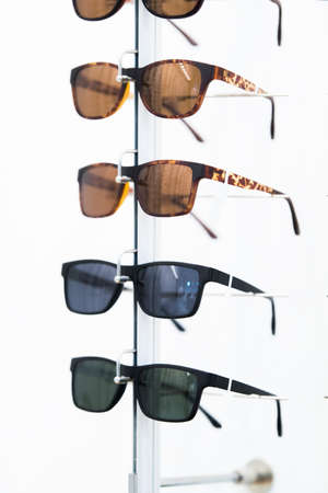 Row of luxury eyeglass at an opticians storeの写真素材