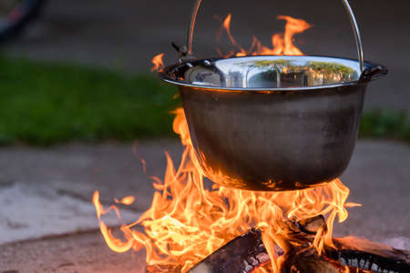 Kettle on the fire - cooking in the natureの写真素材