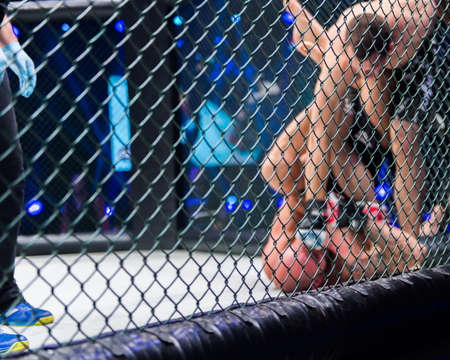  MMA Boxers fighters fight in fights without rules in the ring octagonsのeditorial素材