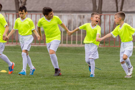 Young children players match on soccer fieldの写真素材