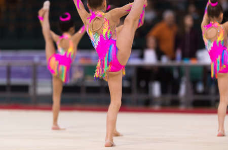 Girl in beautiful gymnastic dress doing exerciseのeditorial素材