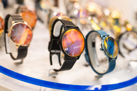  Expensive watch is displayed for sale in luxury shop.