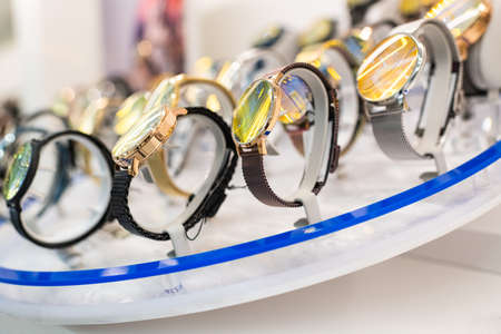  Expensive watch is displayed for sale in luxury shop.