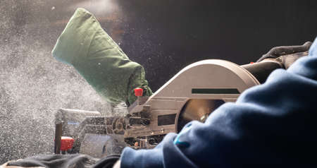 Close up of circular saw and saw dust.の写真素材