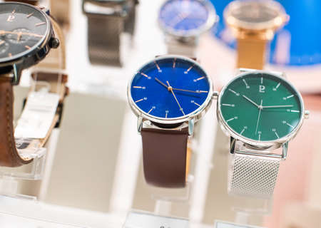  Expensive watch is displayed for sale in luxury shop.