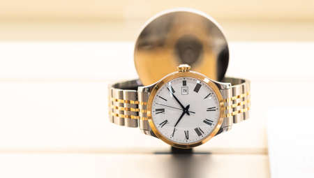 Expensive watch is displayed for sale in luxury shop.の写真素材