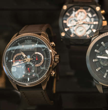  Expensive watch is displayed for sale in luxury shop.の写真素材