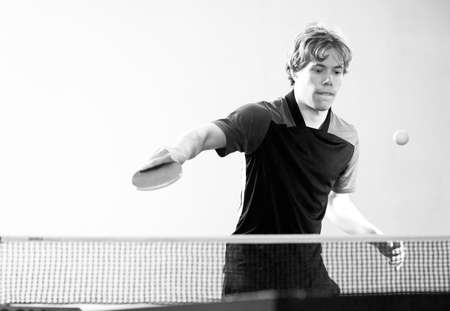 Teenager  playing table tennis. Equipment, moving.の写真素材