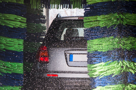 Grey car during washing processの写真素材