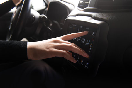 Young beautiful woman driving carの写真素材