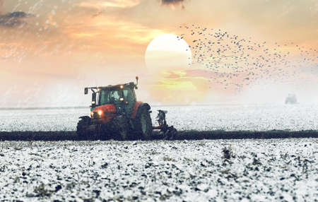 Tractor spraying pesticides on soy field  with sprayer at springの写真素材