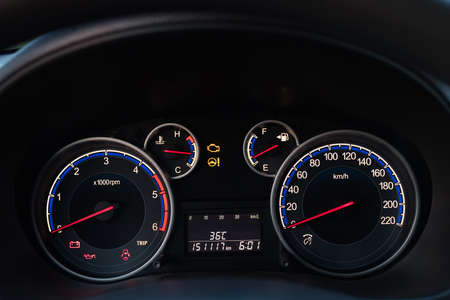 A view of the cockpit of a car driving at night
