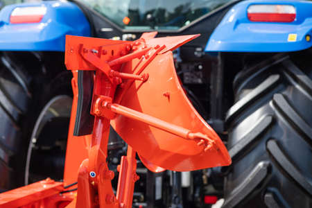 Plow machinery at the agricultural fair outdoor