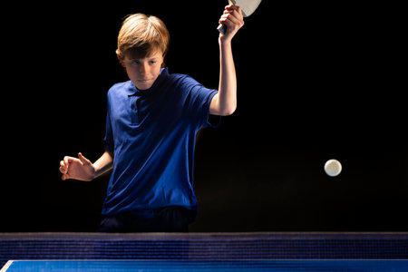 Close up of a table tennis player returning the ballの写真素材