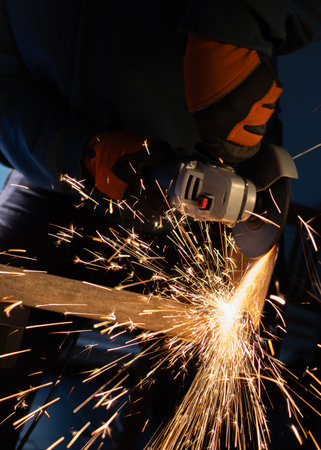 Working grinder with sparks and flame.Close up