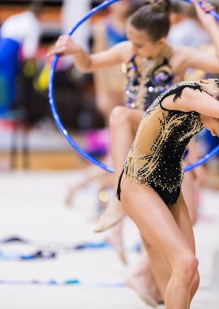 Athletes performing her hoop routine at the Rhythmic gymnastics championshipの写真素材