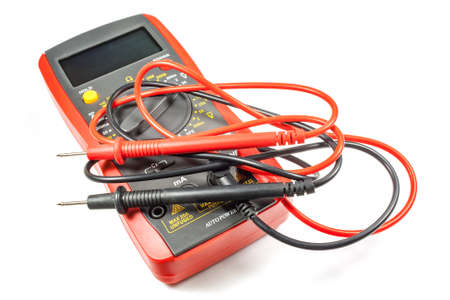 Digital multimeter with probes on a white background